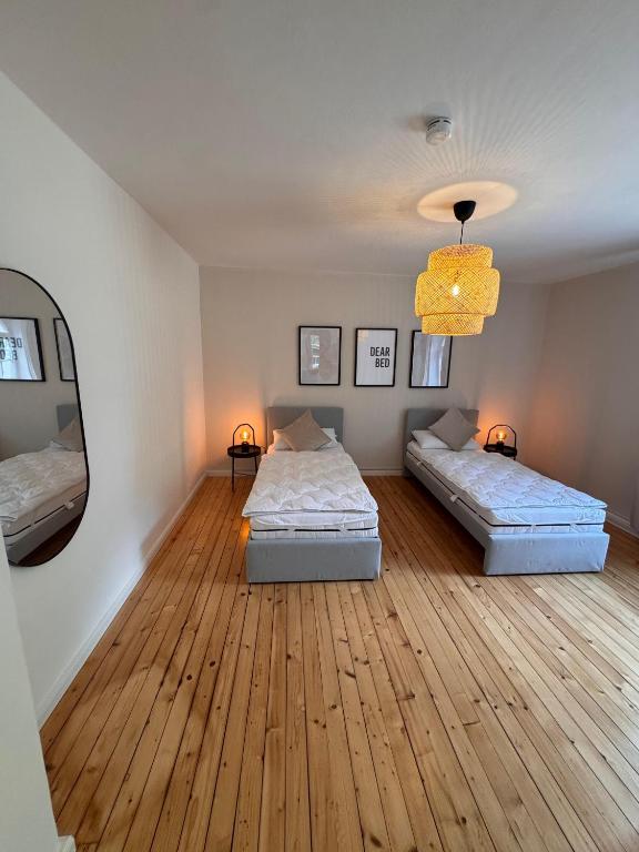 Postel nebo postele na pokoji v ubytování Bavaria Home Apartments Geisenfeld