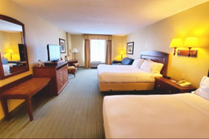 Postel nebo postele na pokoji v ubytování Beach Boutique Hotel