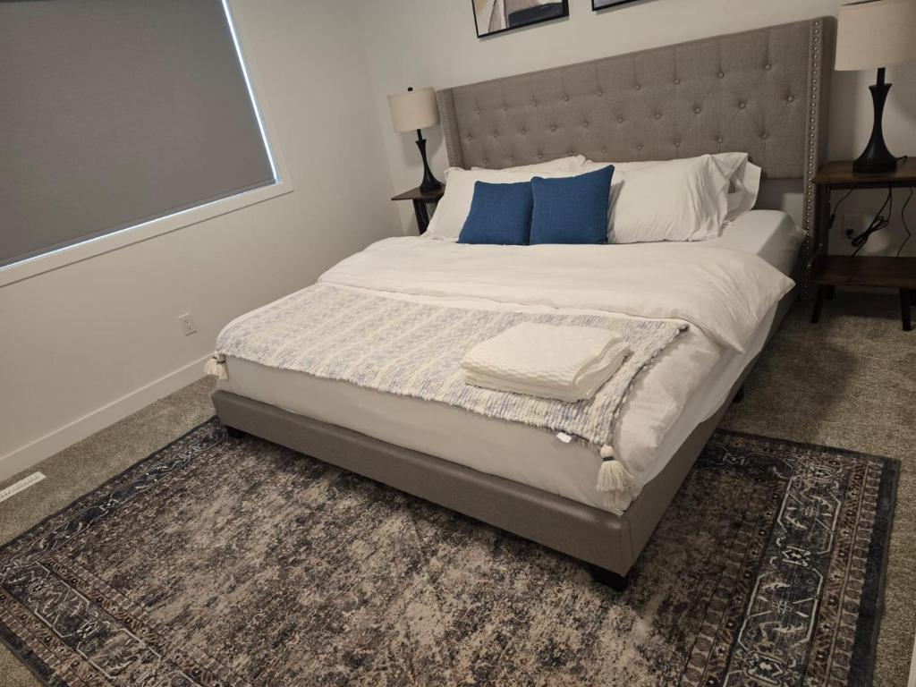 Giường trong phòng chung tại IELS Homes