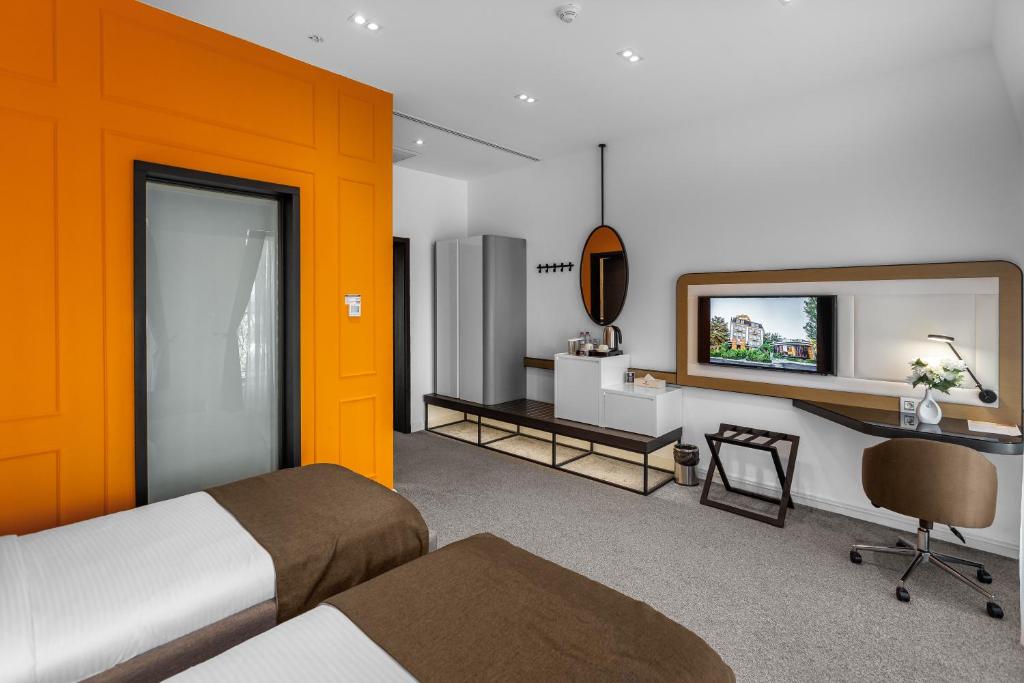 Postel nebo postele na pokoji v ubytování Ivy Garden Hotel Baku