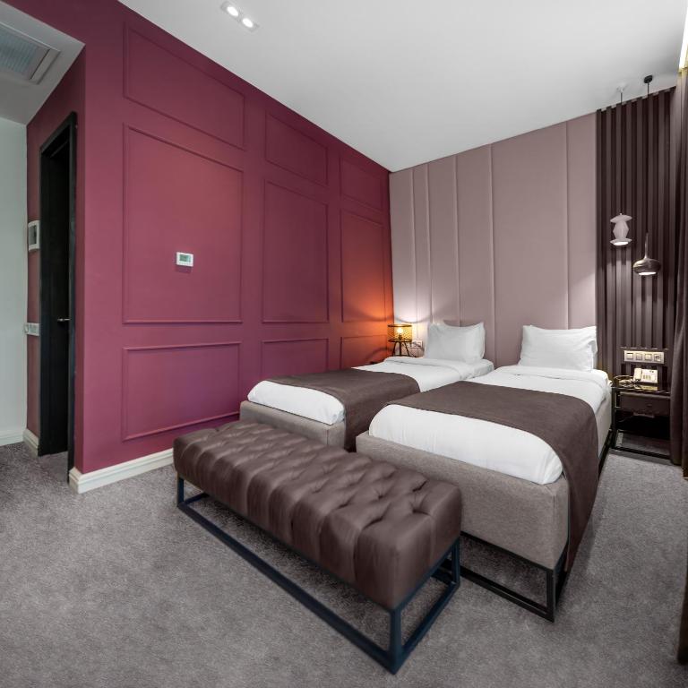 Postel nebo postele na pokoji v ubytování Ivy Garden Hotel Baku