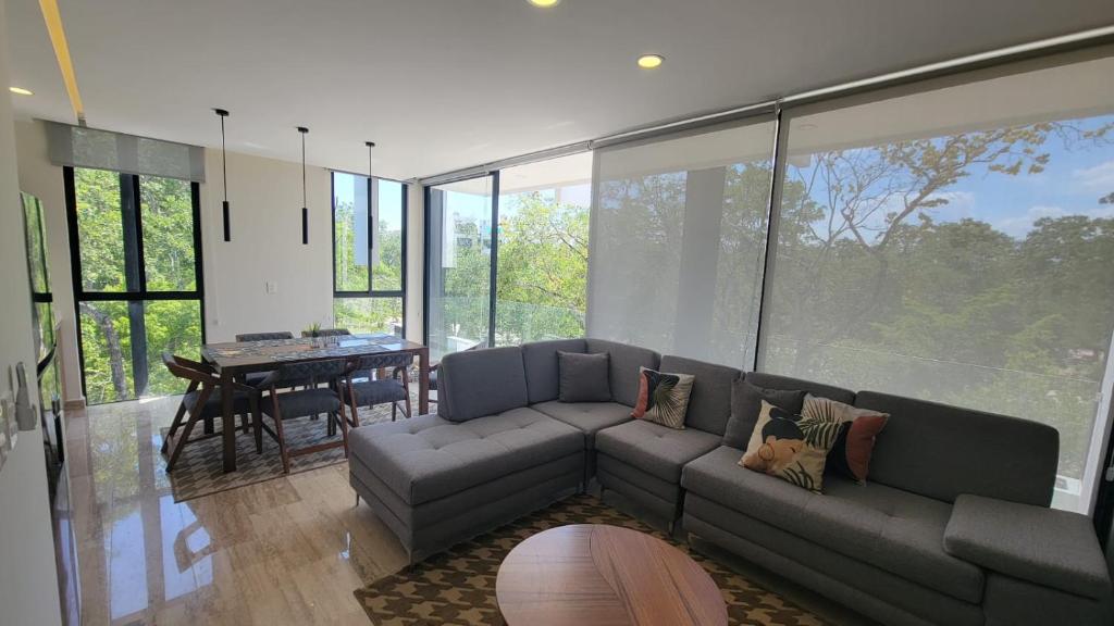 Et opholdsområde på Amour Tulum Luxury Condo Aldea Zama