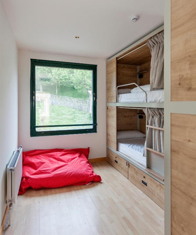 Postel nebo postele na pokoji v ubytování A Room In The City Hostel