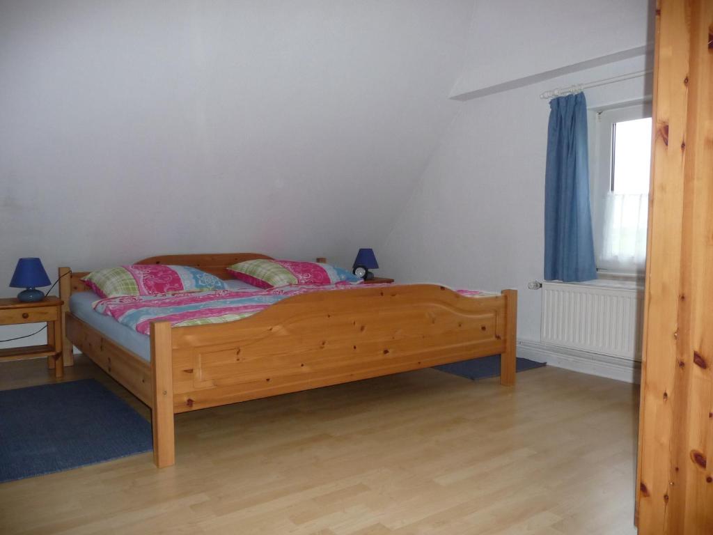 Postel nebo postele na pokoji v ubytování Haus Heverstrom