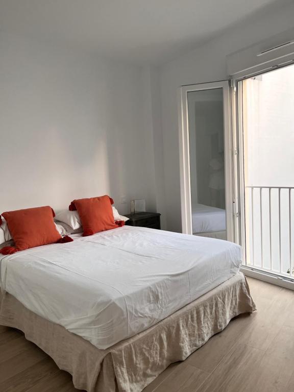 Postel nebo postele na pokoji v ubytování Casa El Puerto