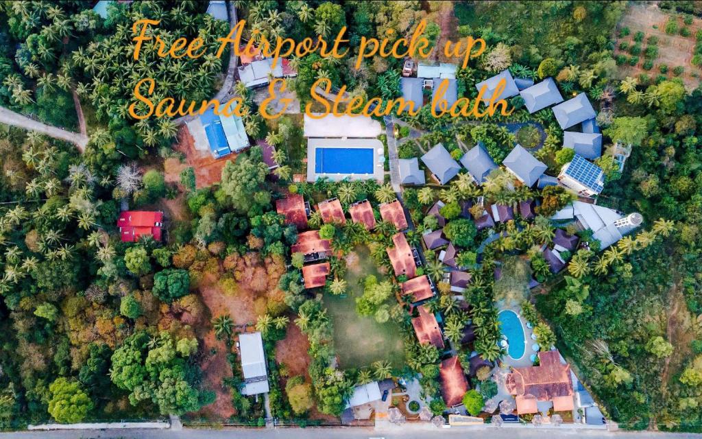an overhead view of a home with trees and houses at Herbal Resort & Spa in Phu Quoc