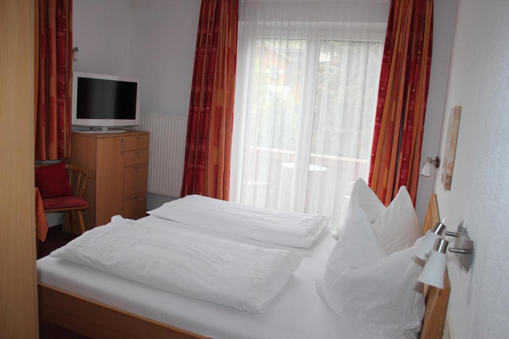 Postel nebo postele na pokoji v ubytování Haus Margit