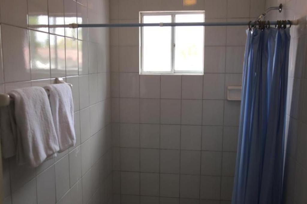 Koupelna v ubytování Curacao Lodge