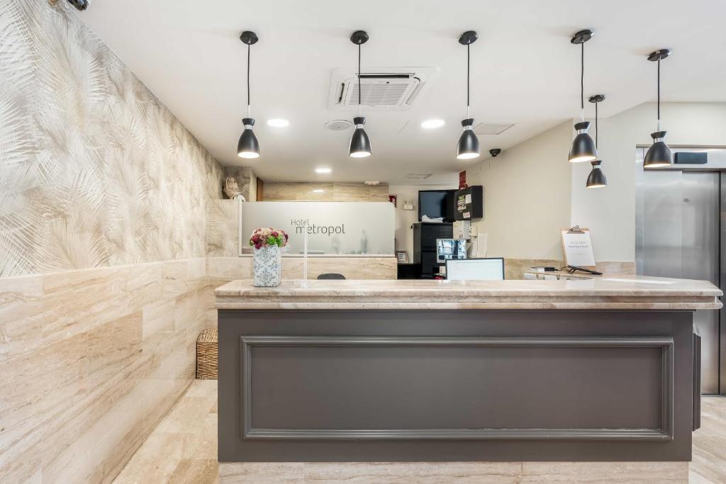 Kuchyň nebo kuchyňský kout v ubytování Hotel Metropol