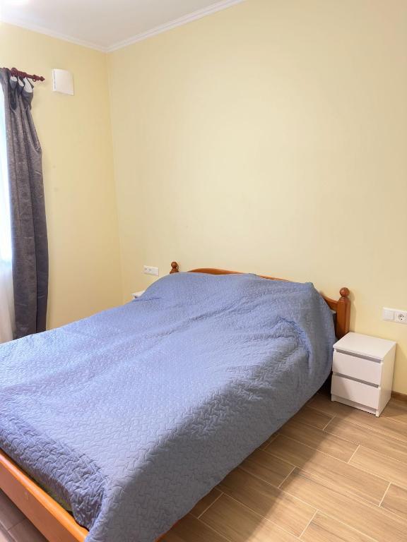 Postel nebo postele na pokoji v ubytování Appartament Karja 26A/10