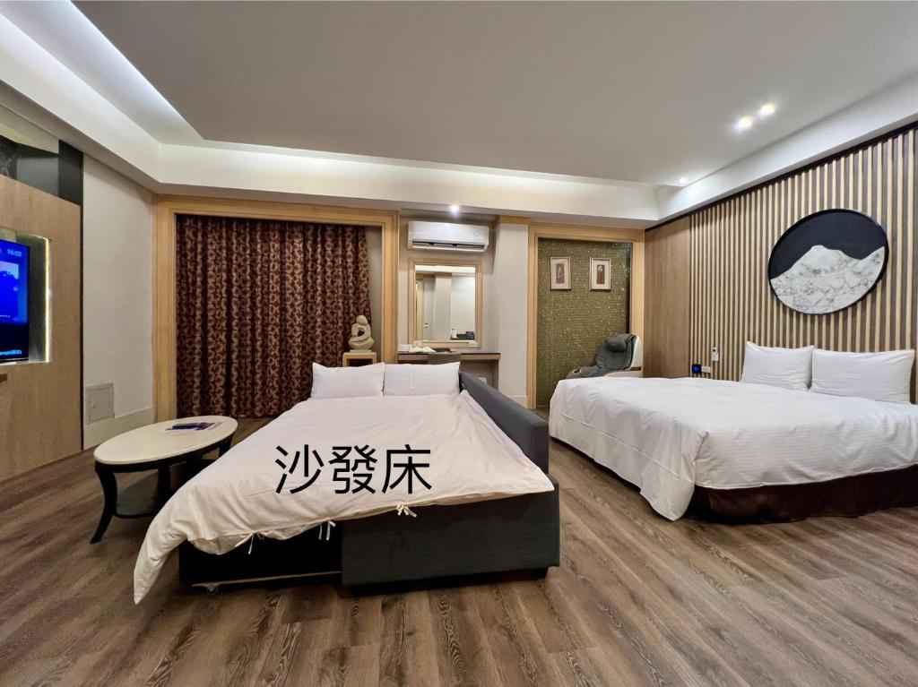 Postel nebo postele na pokoji v ubytování Cigar Motel