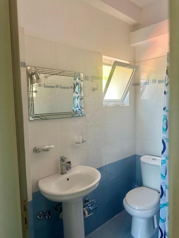 Koupelna v ubytování Lumra Rooms