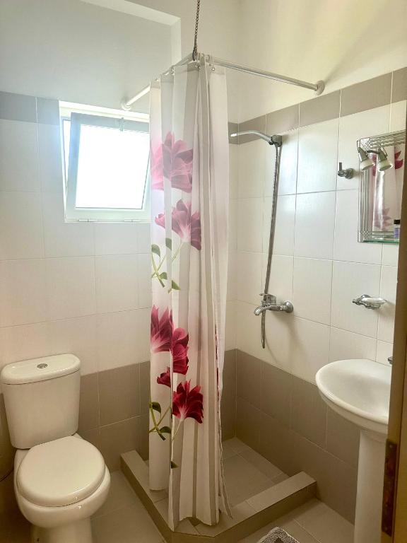 Koupelna v ubytování Lumra Rooms
