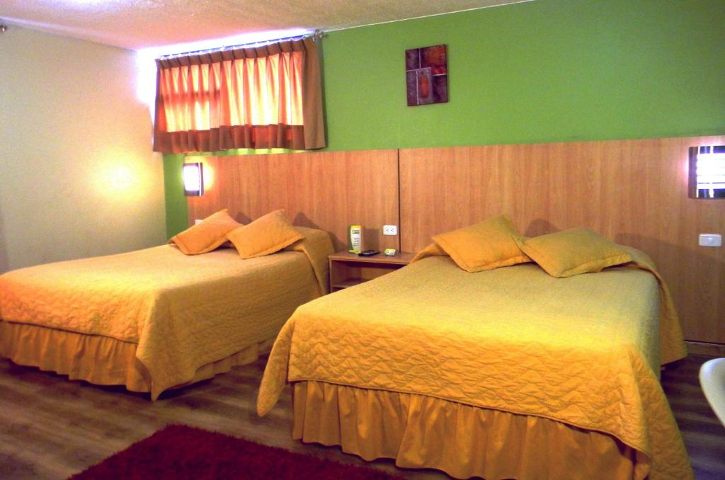 Postel nebo postele na pokoji v ubytování Hostal Terra 3 - BASE AÉREA