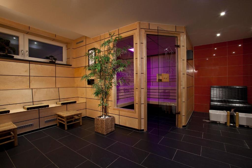 TV a/nebo společenská místnost v ubytování Hotel Schiller