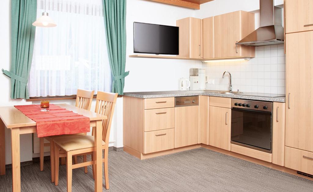 Kuchyň nebo kuchyňský kout v ubytování Haus Arnika