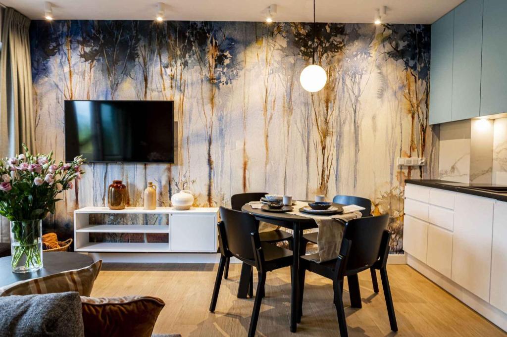 Μια τηλεόραση ή/και κέντρο ψυχαγωγίας στο Apartament Blue Mountain