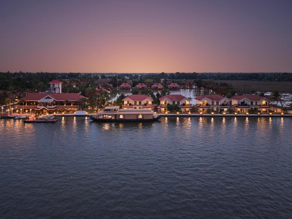 an aerial view of a resort on the water at Sterling Lake Palace Alleppey in Alleppey