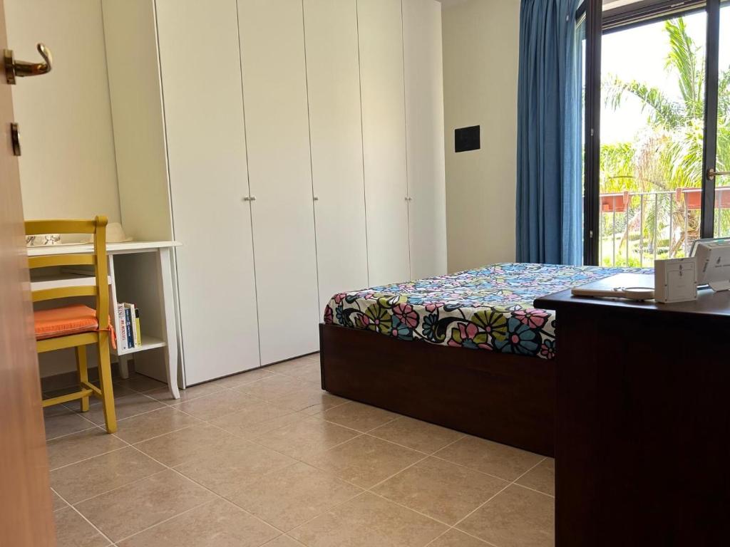 Postel nebo postele na pokoji v ubytování Alisea - Il respiro del mare a Marinagri