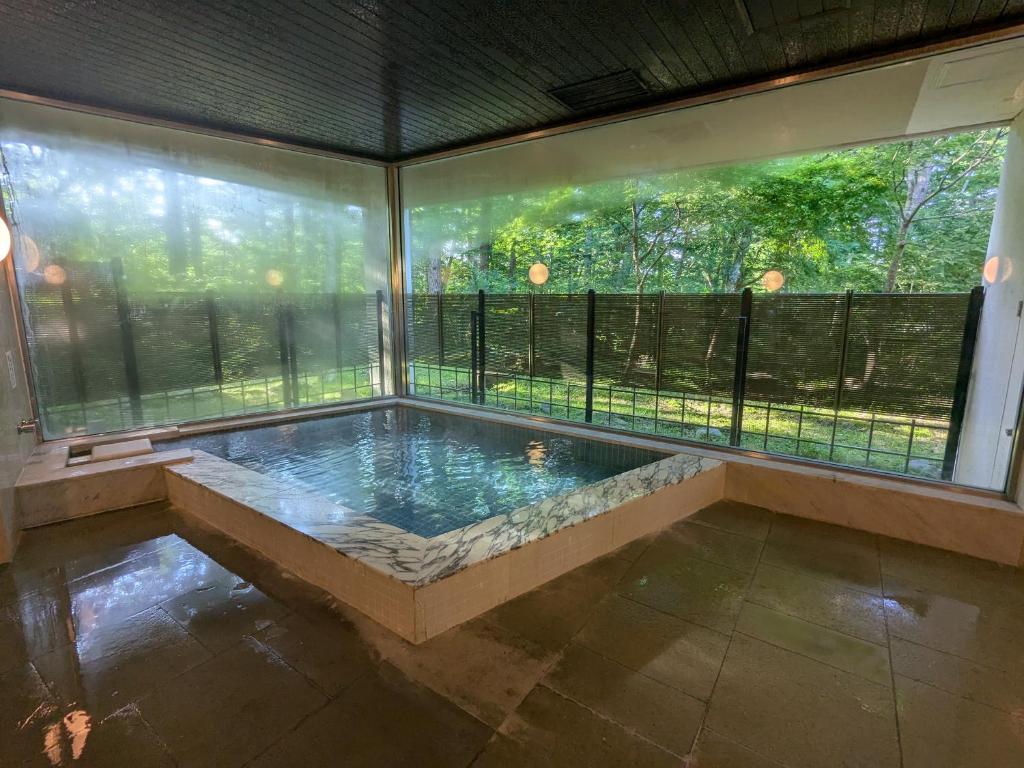 Piscina a 富士たから荘 旭日館 o a prop