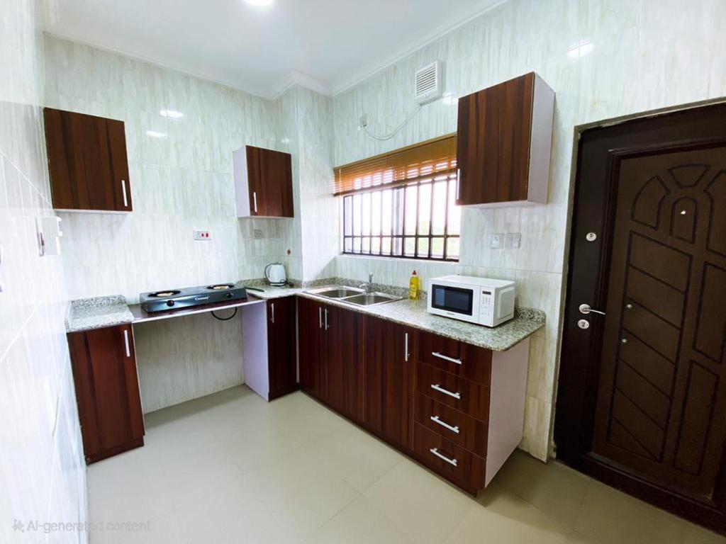 Kuchyň nebo kuchyňský kout v ubytování Apartment cattleya