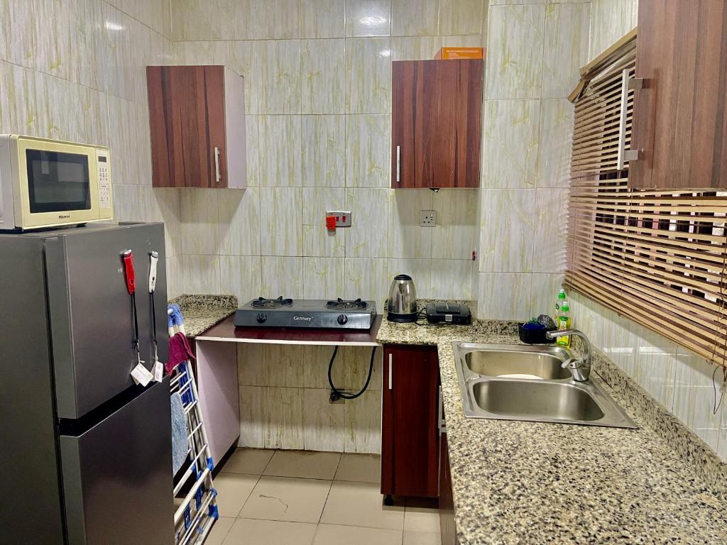 Kuchyň nebo kuchyňský kout v ubytování Apartment cattleya