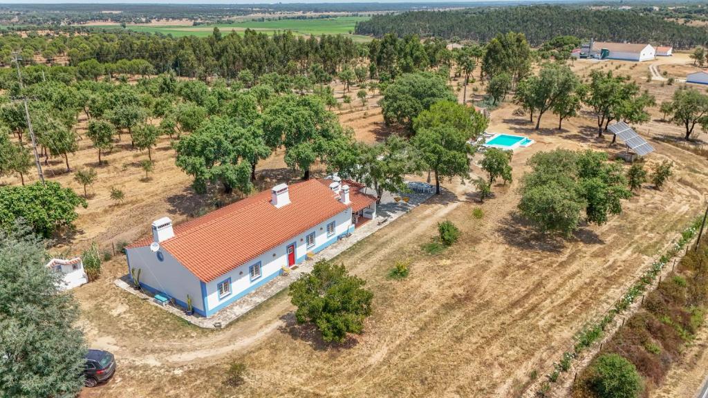 an aerial view of a house with a red roof at Alma Alentejo Villa in Bicos