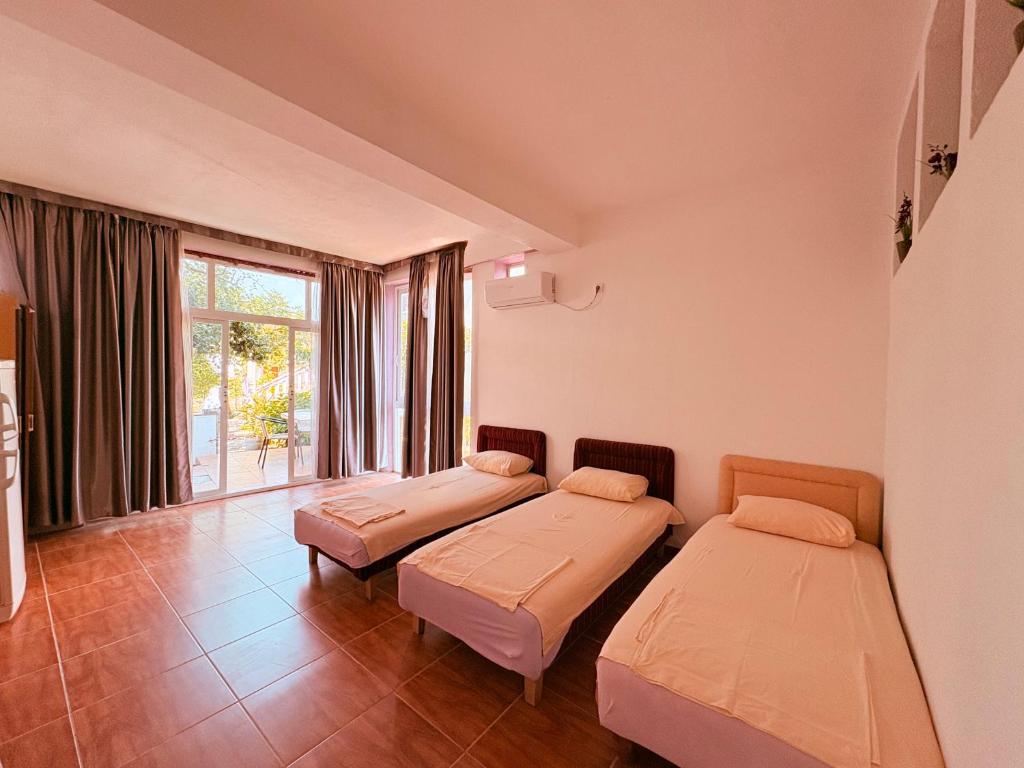 Letto o letti in una camera di Shkreli Apartments