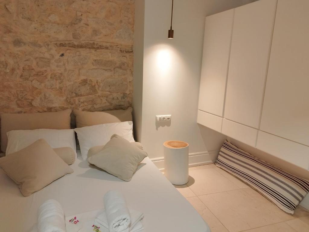 A bed or beds in a room at Candia Strada
