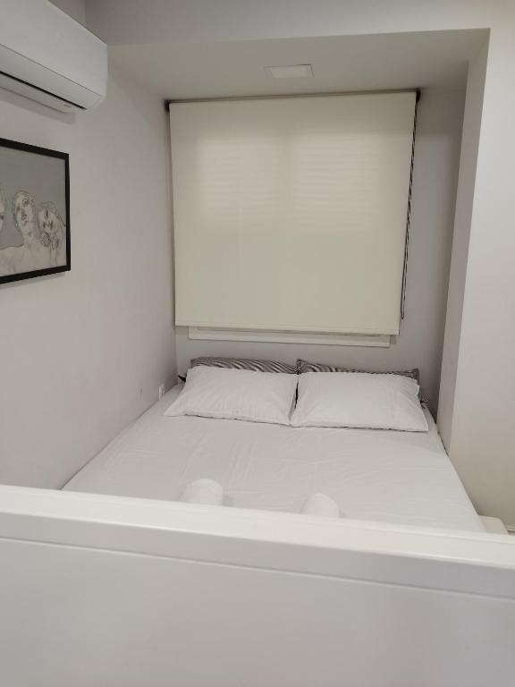 A bed or beds in a room at Candia Strada