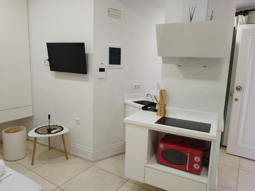 A kitchen or kitchenette at Candia Strada