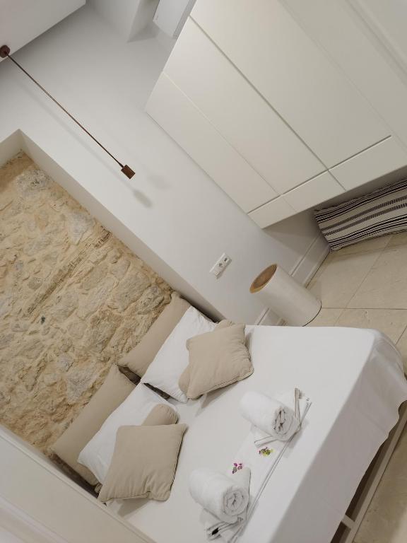 A bed or beds in a room at Candia Strada
