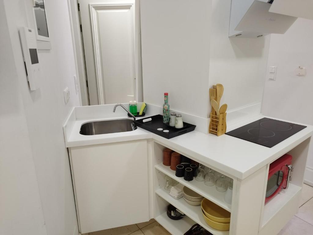 A kitchen or kitchenette at Candia Strada