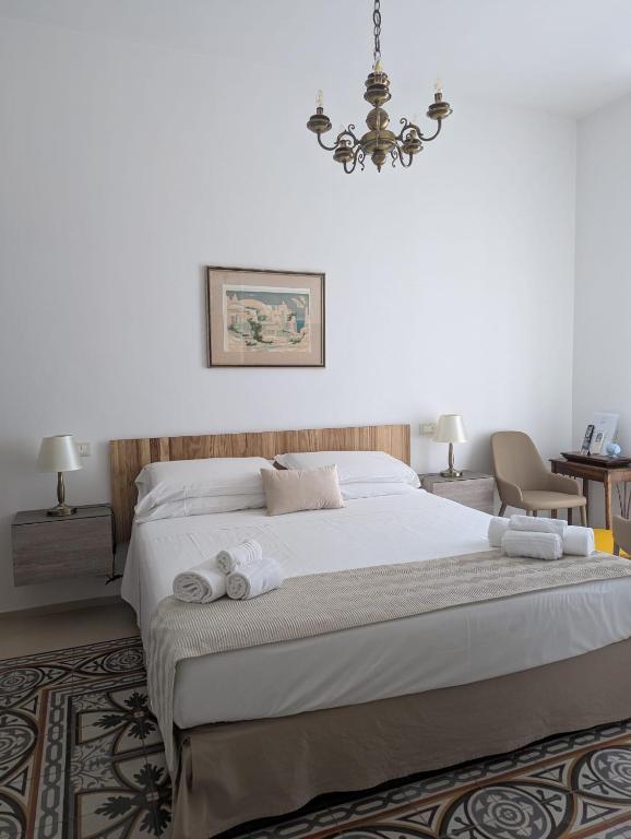 Postel nebo postele na pokoji v ubytování Al Corso Charming Rooms