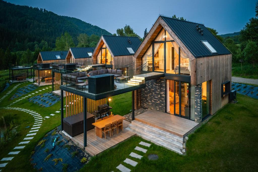 an overhead view of a house with a lot of windows at Krzywe Pearl Chalets in Krywe