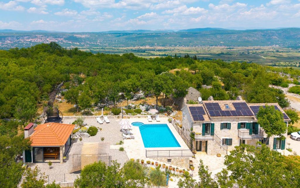 Villa Lugareva with 52 sqm private pool, 4 bedrooms, 4 bathrooms, summer kitchen, traditional environment, playground