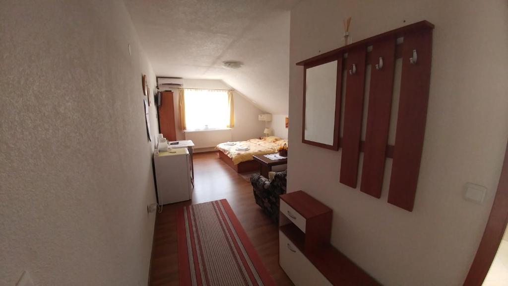Posteľ alebo postele v izbe v ubytovaní Guest House Mijić