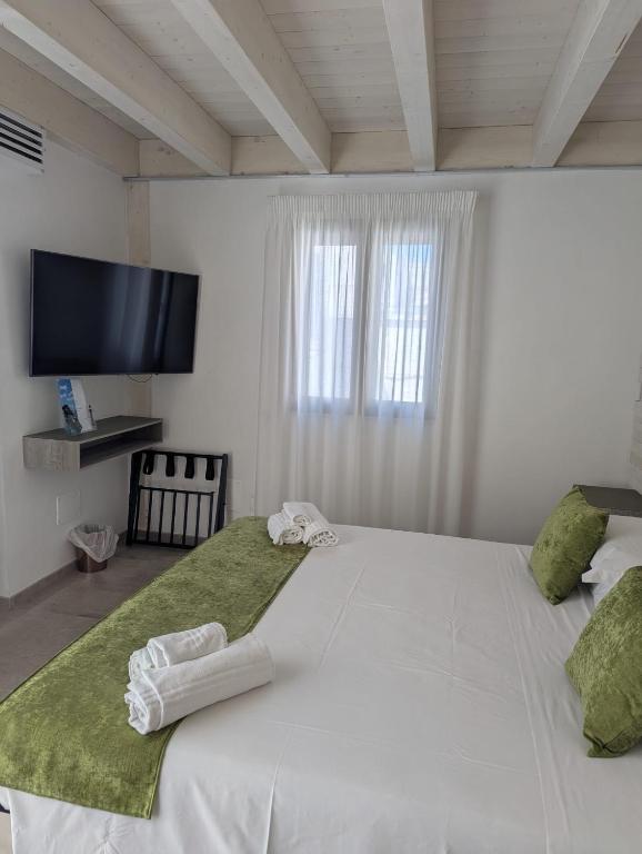 Postel nebo postele na pokoji v ubytování Al Corso Charming Rooms