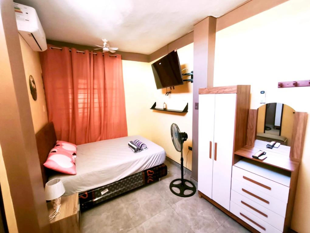 Postel nebo postele na pokoji v ubytování Departamento Moderno y Acogedor con aire acondicionado