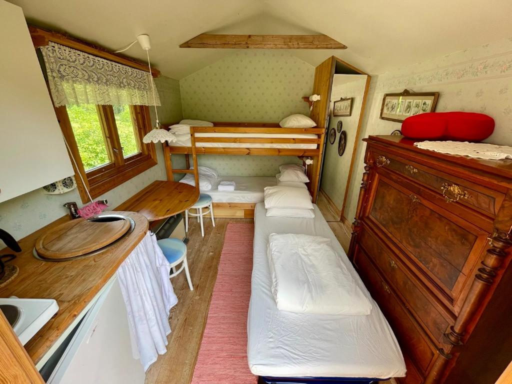 Postel nebo postele na pokoji v ubytování Björnåsen Bear Hill