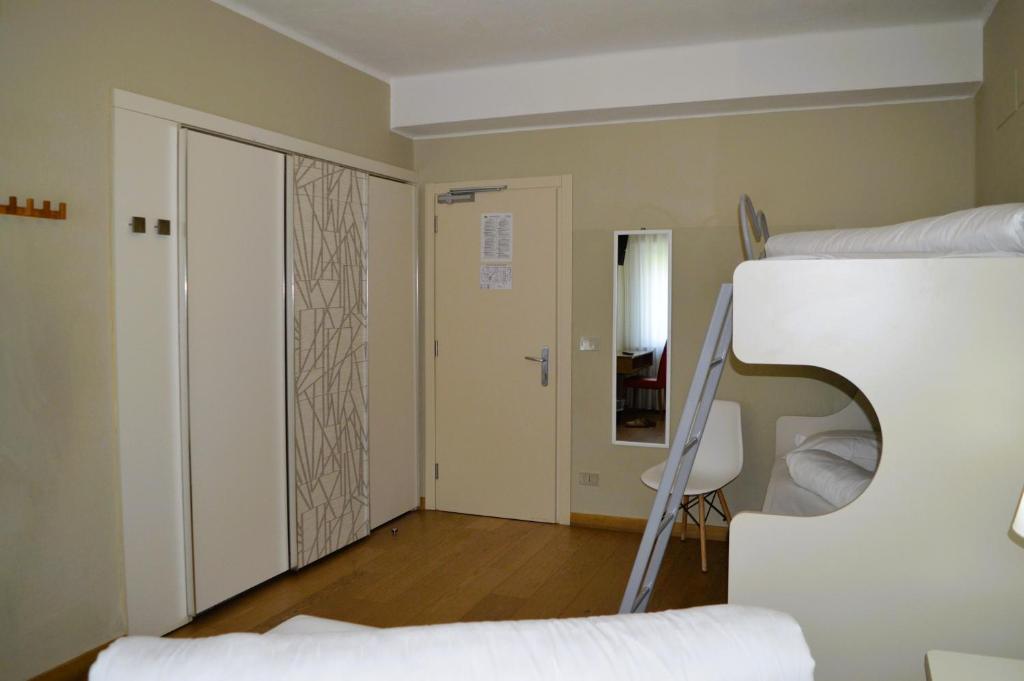 Postel nebo postele na pokoji v ubytování Park Hotel Sancelso