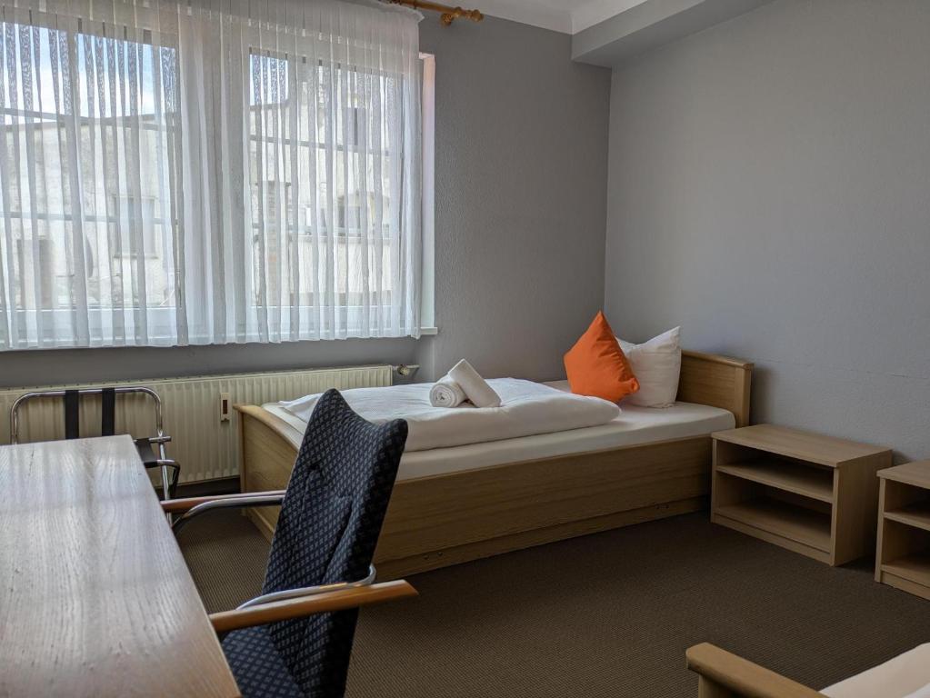 Postel nebo postele na pokoji v ubytování Hotel Walzwerk