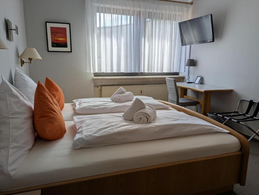 Postel nebo postele na pokoji v ubytování Hotel Walzwerk