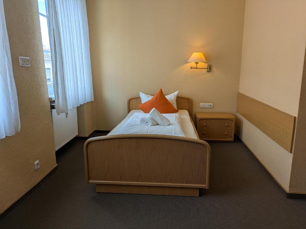 Postel nebo postele na pokoji v ubytování Hotel Walzwerk