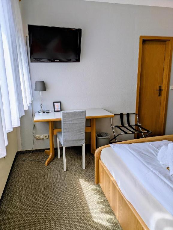 Postel nebo postele na pokoji v ubytování Hotel Walzwerk
