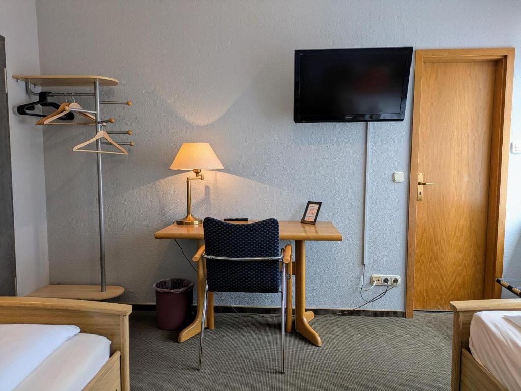 TV a/nebo společenská místnost v ubytování Hotel Walzwerk