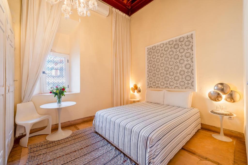 Postel nebo postele na pokoji v ubytování Maison Du Tresor