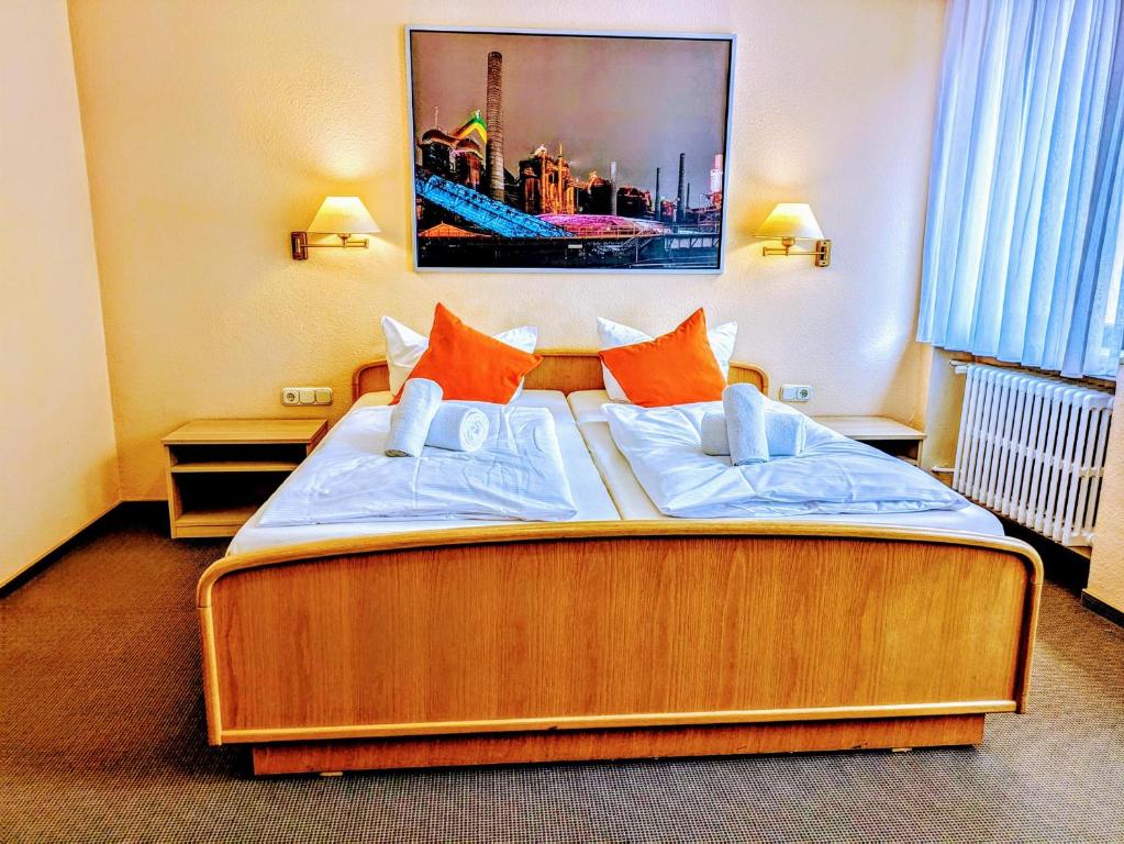 Postel nebo postele na pokoji v ubytování Hotel Walzwerk