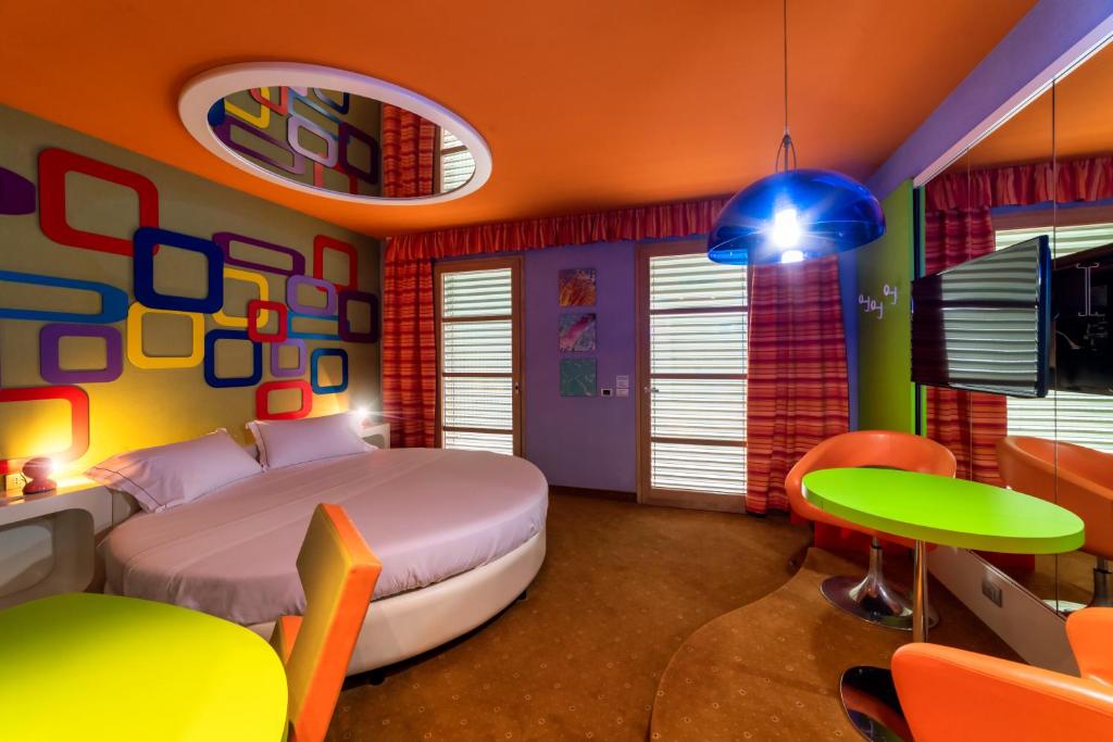 Postel nebo postele na pokoji v ubytování Motel Hotel Piranha
