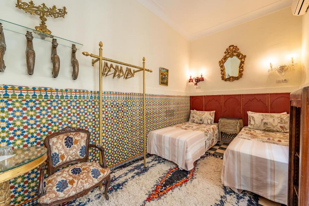 Postel nebo postele na pokoji v ubytování Maison Du Tresor